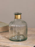 Nkuku Brass Chara Lines hammered glass bottle, imported from the UK