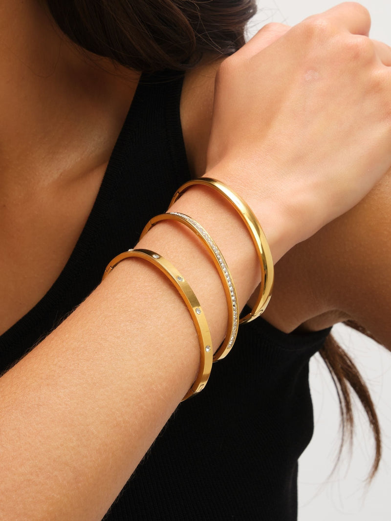 Jon Richard gold plated stainless steel waterproof bangle, UK version
