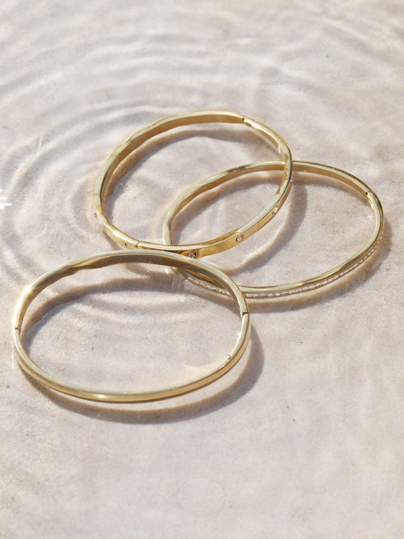 Jon Richard gold plated stainless steel waterproof bangle, UK version