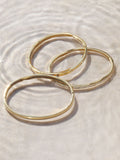 Jon Richard gold plated stainless steel waterproof bangle, UK version