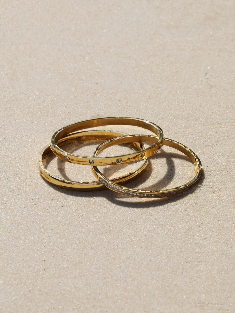 Jon Richard gold plated stainless steel waterproof bangle, UK version