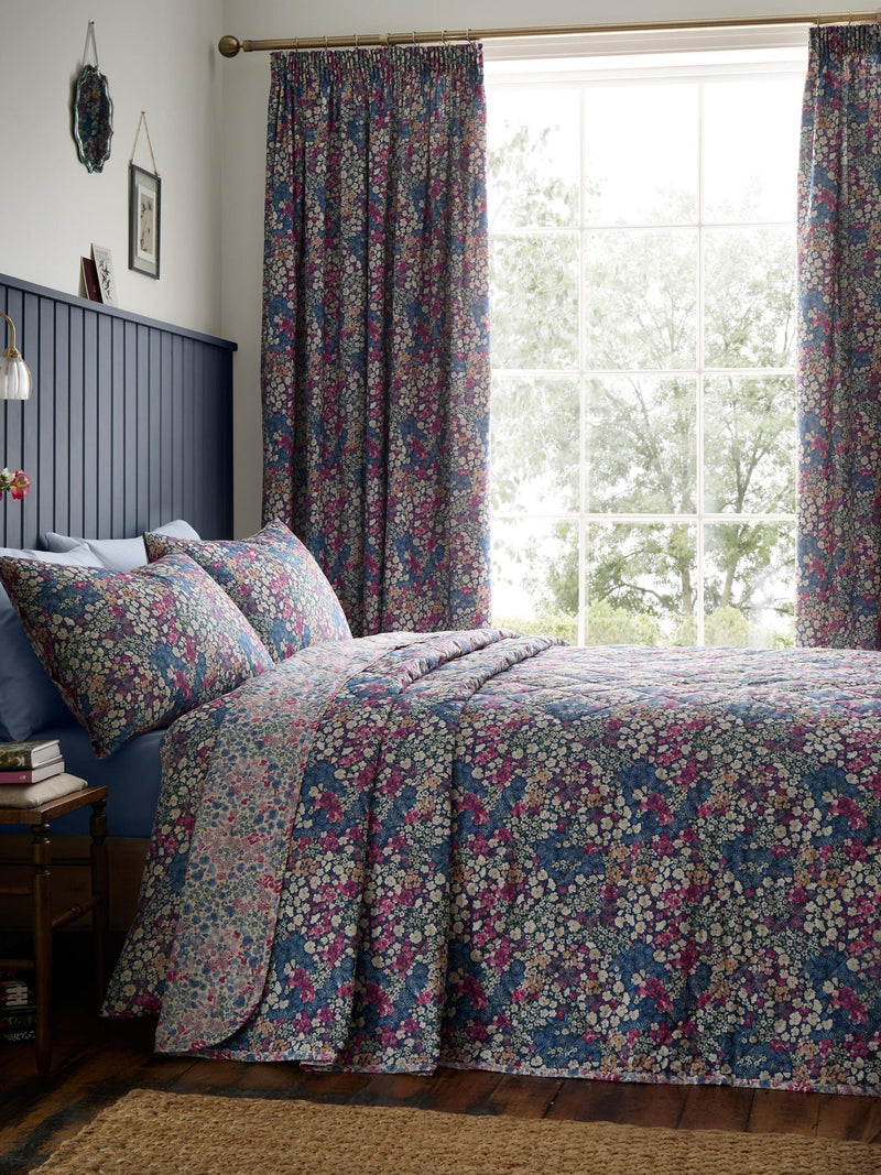 Dreams & Drapes Bessie navy quilted bedspread with floral print, UK version