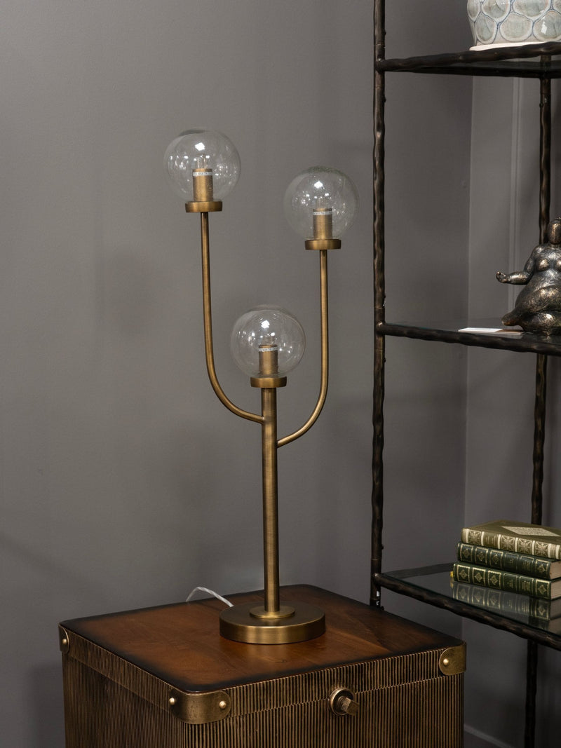 Libra Interiors antique brass three globe table lamp (British brand)