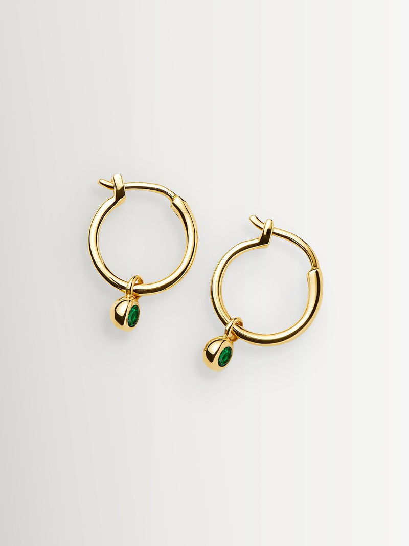 Missoma gold tone tennis charm mini hoop earrings, imported from the UK