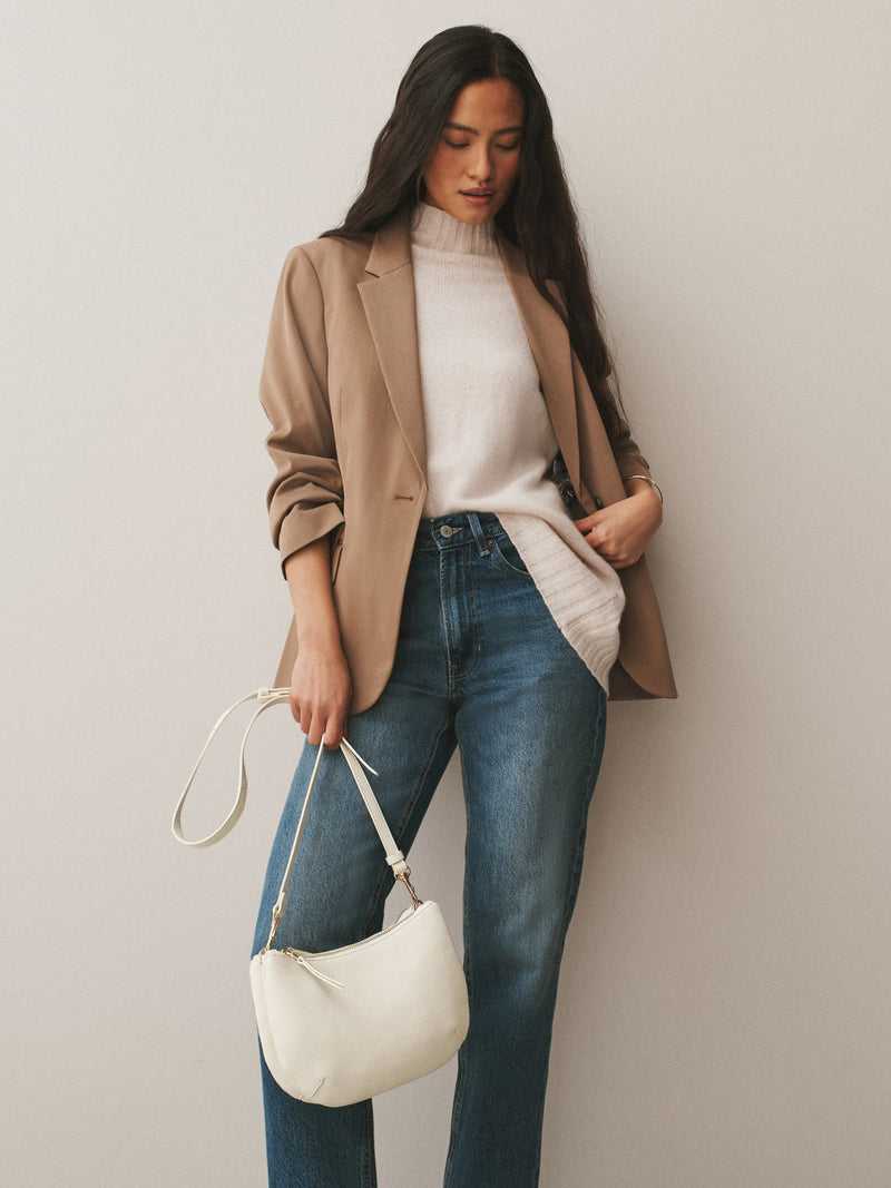 White leather scoop cross-body bag with adjustable strap, UK version