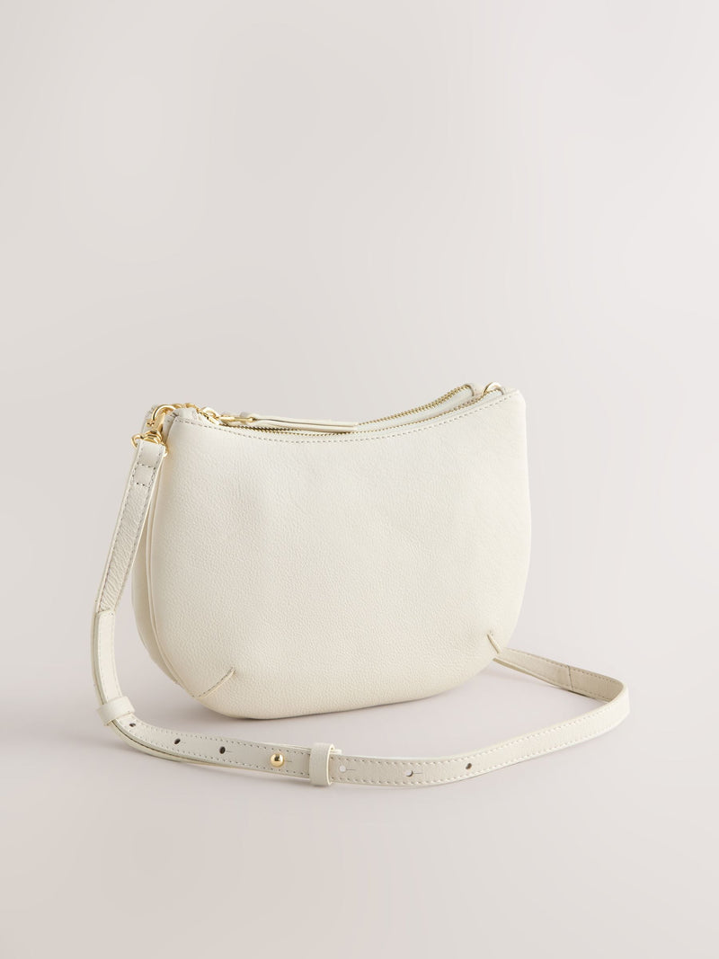 White leather scoop cross-body bag with adjustable strap, UK version