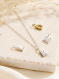 Posh Totty Designs silver tone CZ initial necklace, imported from the UK