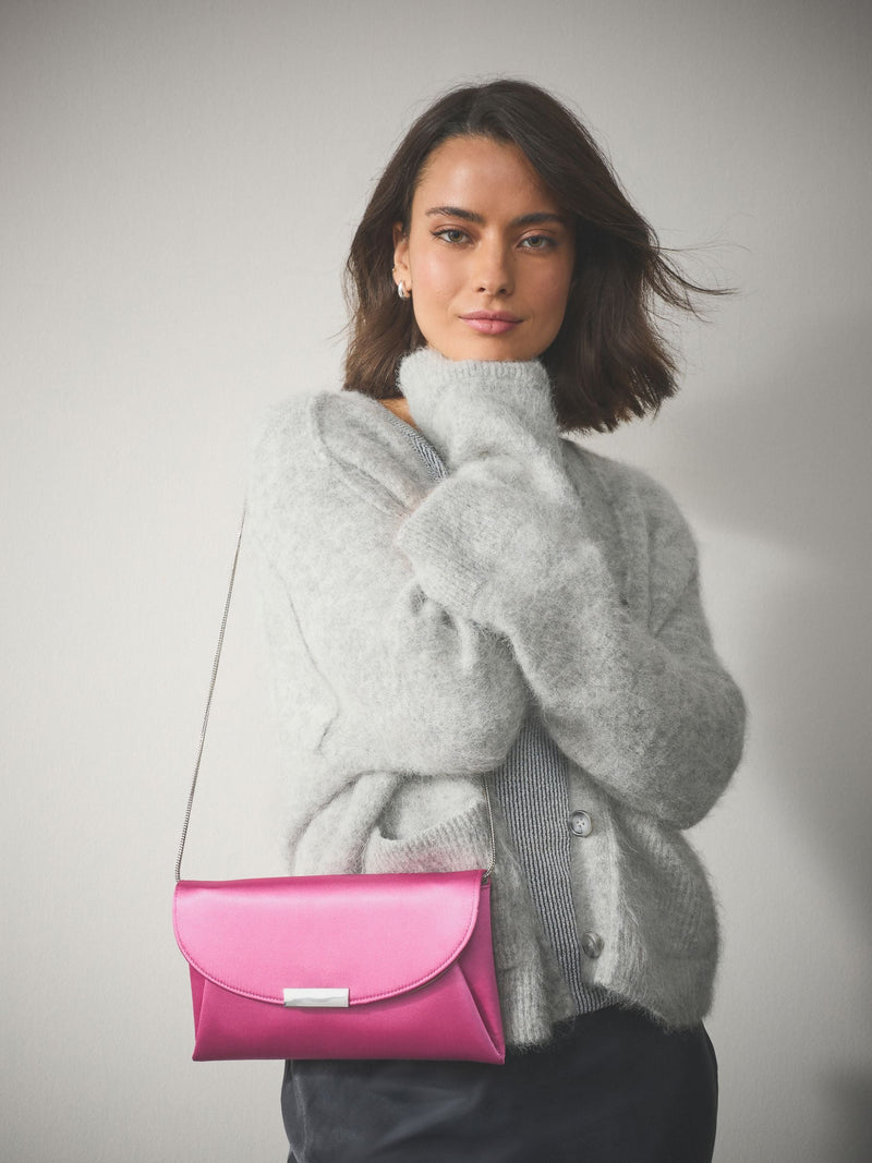 Pink clutch bag with chain strap (British brand)