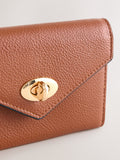 Tan brown envelope lock purse with gold-tone lock (British brand)