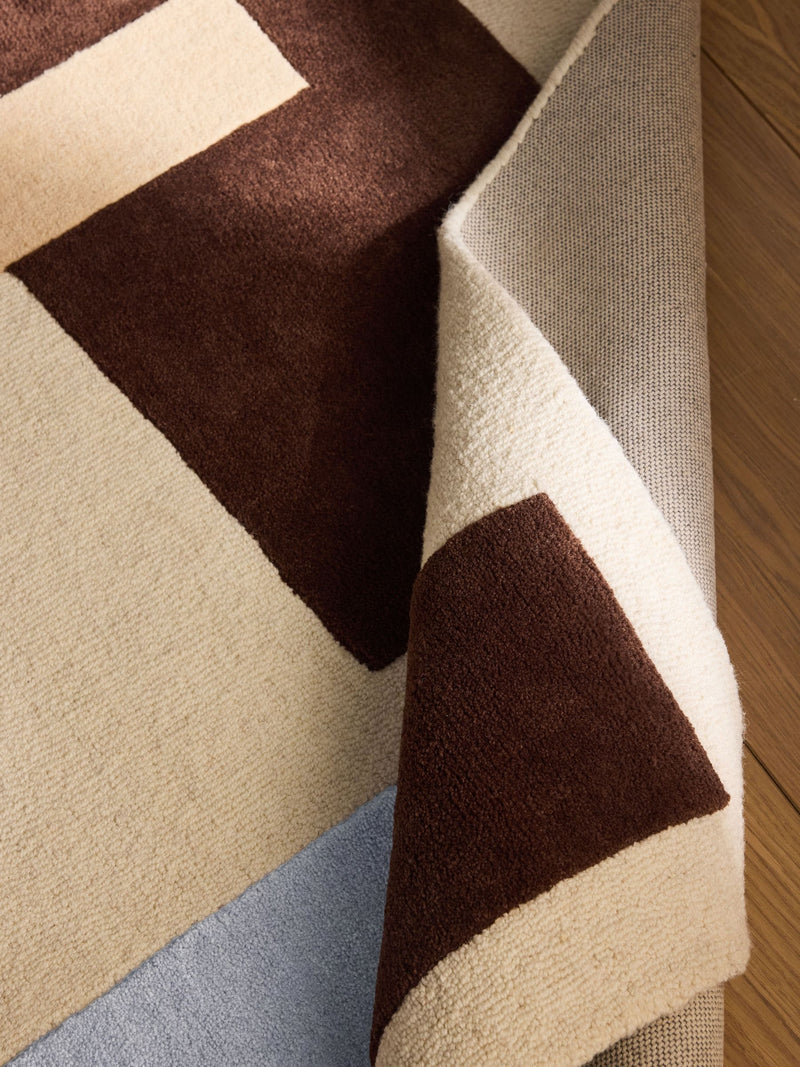 MADE.COM wool tufted rug with geometric design, imported from the UK