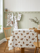 Next Catherine Lansfield Natural Angus Highland Cow Cotton Table Cloth 137x229cm- Buy online at McGrocer