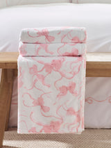 Next Catherine Lansfield Pink Oversized Bow Cosy Fleece Blanket Throw 200x230 cm- Buy online at McGrocer