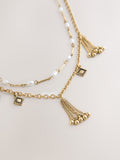 Gold tone tassel chain layered necklace (British brand)