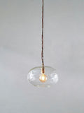 Nkuku clear glass pendant ceiling light with brass fittings - British product