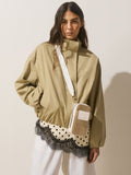 Raffia-effect phone bag with zip closure and adjustable strap, UK version