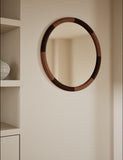 Marlowe round wall mirror with two-tone wood frame, imported from the UK