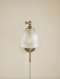 Ribbed plug in wall light with antique brass finish, imported from the UK