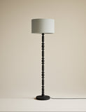 Bobbin floor lamp with wooden detailing and cylinder shade, imported from the UK