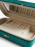 Velour travel jewellery box with compartments and mirror (British brand)