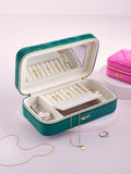 Velour travel jewellery box with compartments and mirror (British brand)