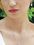 Ivory & Co Silver Stockholm Pearl Circle Drop Pendant Necklace with 2cm pendant and 18cm chain, UK version