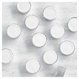 Undecorated vanilla cupcakes with white icing, 12 pack (British brand)