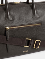 Sac de voyage en cuir souple avec détails vintage et bandoulière réglable