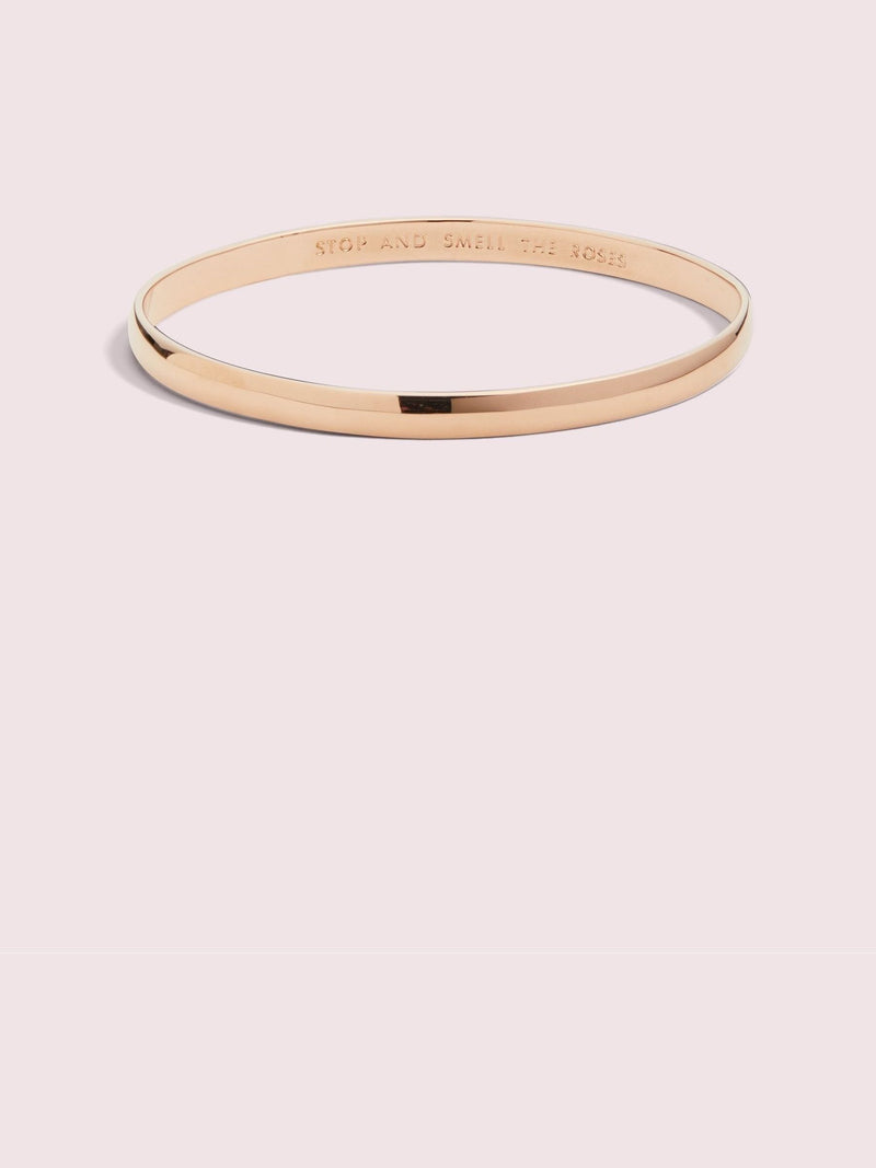 Kate Spade rose gold tone idiom bangle, UK version