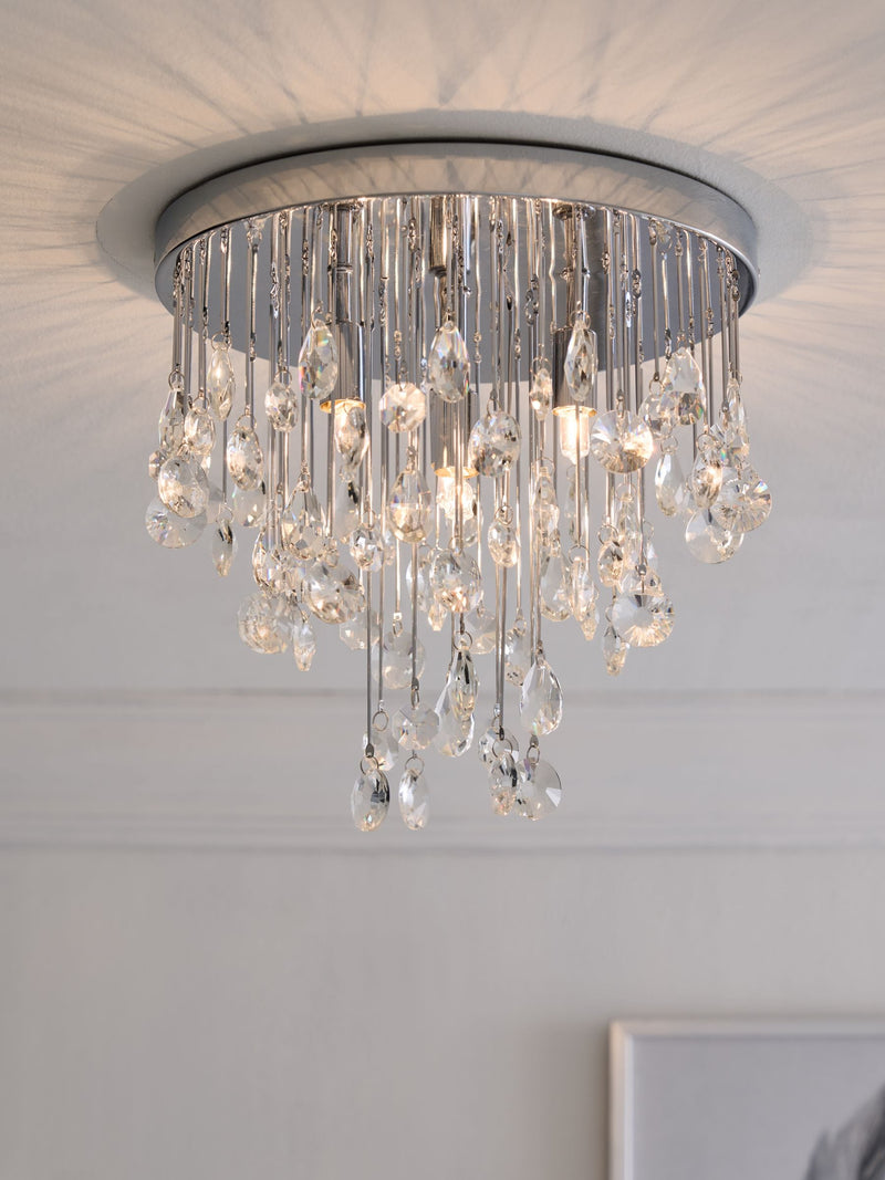 Chrome Izzie 4-light flush ceiling light, imported from the UK