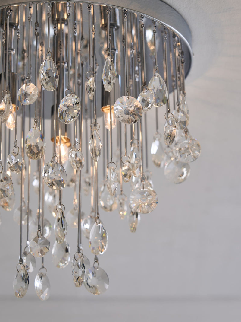 Chrome Izzie 4-light flush ceiling light, imported from the UK
