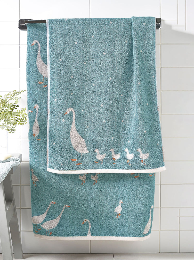 Teal blue cotton towel with geese design, UK version