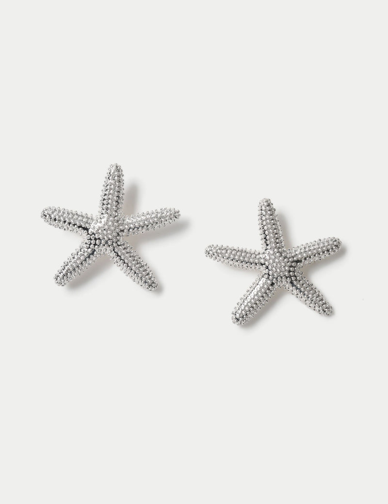 Rhodium oversized starfish stud earrings, imported from the UK