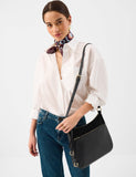 Accessorize leather curved messenger bag with suede, UK version