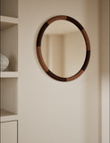 Marlowe round wall mirror with two-tone wood frame, imported from the UK