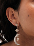 Mood gold tone stars and moon drop earrings, imported from the UK