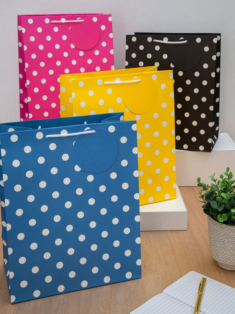 Hallmark set of 4 large polka dot gift bags, UK version