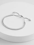 Silver tone baguette stone pully bracelet (British brand)
