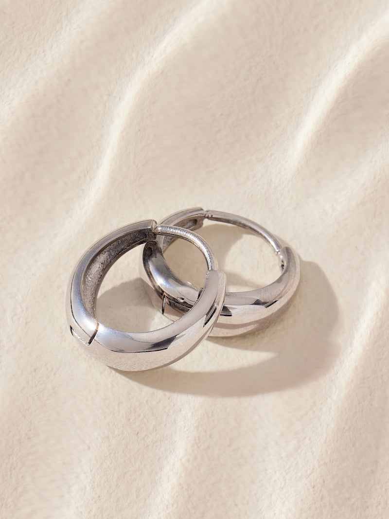 Silver tone stainless steel huggie hoop earrings (British brand)
