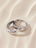 Silver tone stainless steel huggie hoop earrings (British brand)