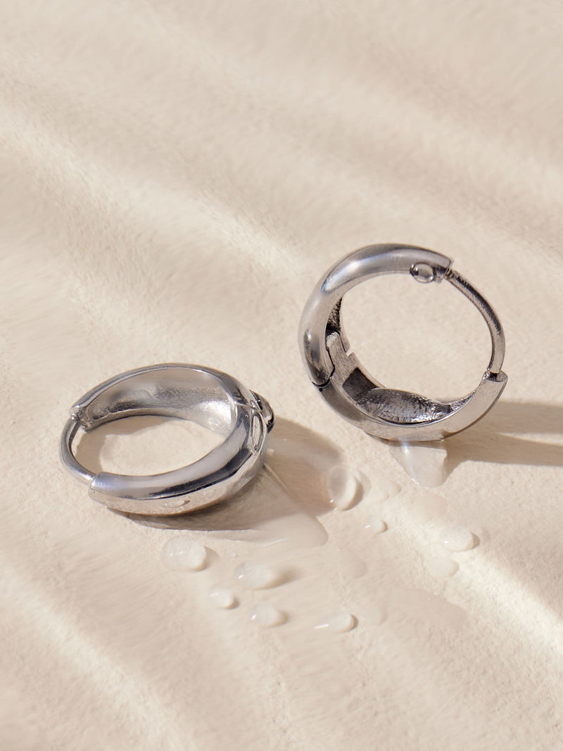 Silver tone stainless steel huggie hoop earrings (British brand)