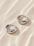 Silver tone stainless steel huggie hoop earrings (British brand)