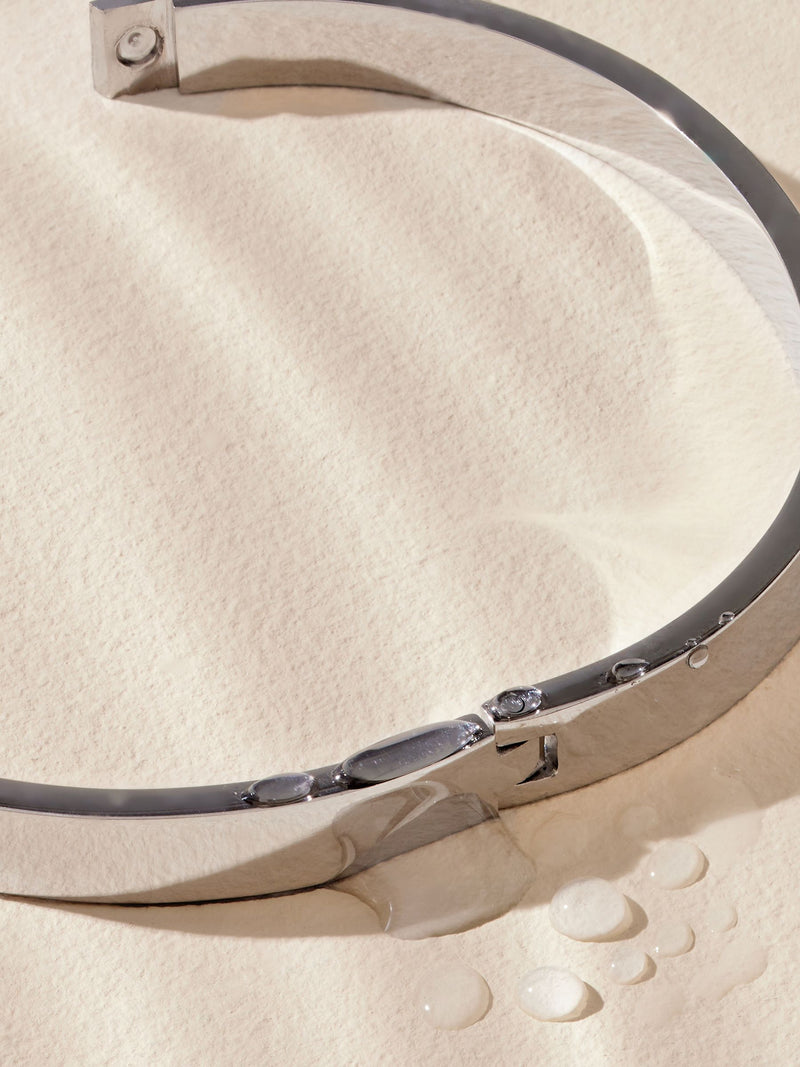 Silver tone stainless steel bangle (British brand)