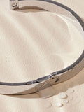 Silver tone stainless steel bangle (British brand)