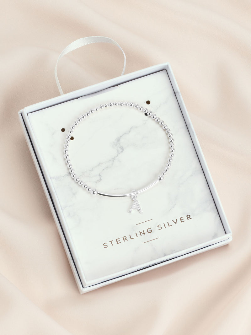Sterling silver initial cubic zirconia beaded stretch bracelet (British brand)