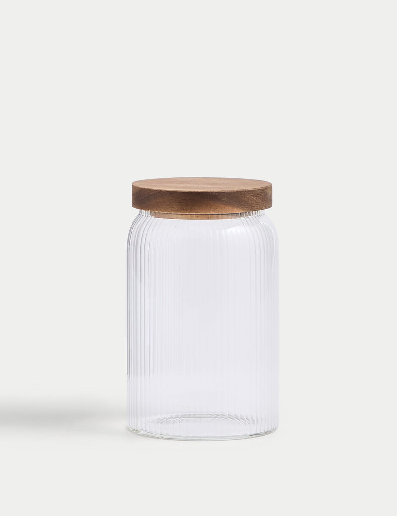 Medium ribbed glass storage jar with wooden lid, 16cm tall, imported from the UK