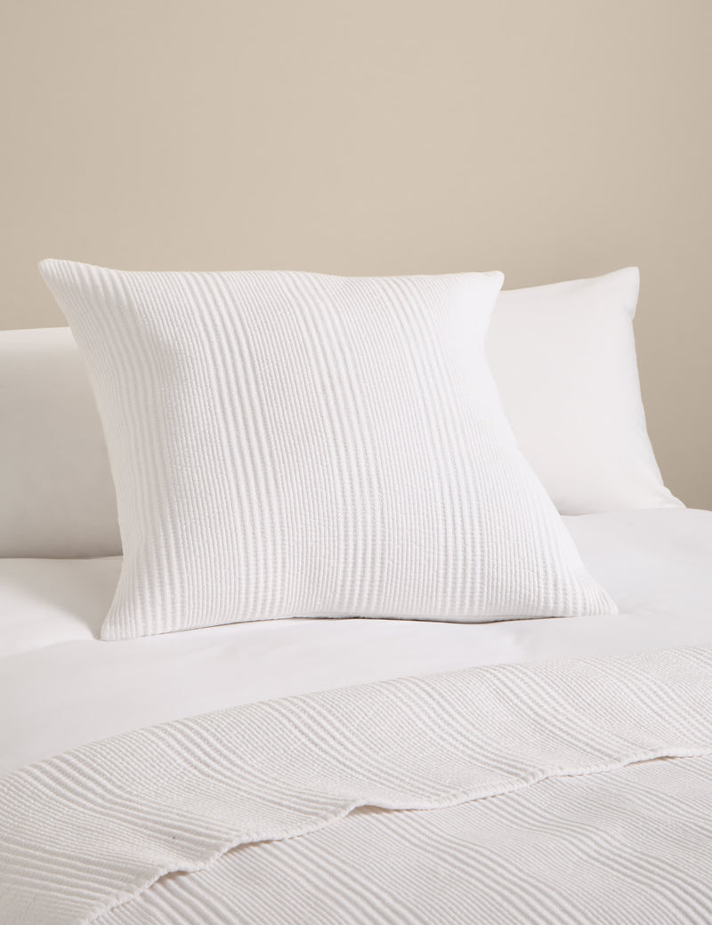 Decorative cushion with cotton rich fabric and striped design (British brand)