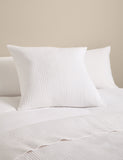 Decorative cushion with cotton rich fabric and striped design (British brand)