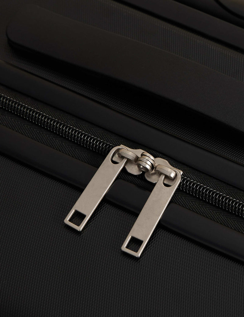 Pisa 4 wheel hard shell medium suitcase, imported from the UK
