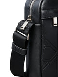 Calvin Klein black embossed emblem reporter bag, UK version