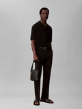 Calvin Klein black embossed emblem reporter bag, UK version